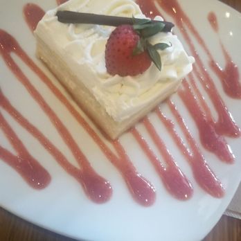 Pambiche - Tres leche cake slice with some guayaba for decorating - Cuban Near Me - Portland, Oregon Pambiche - Tres leche cake slice with some guayaba for decorating - Cuban Near Me - Portland, Oregon