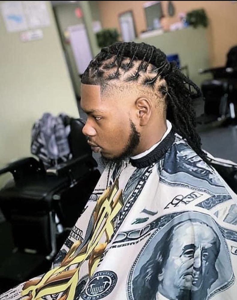 Manetain’d by Marquis Logo