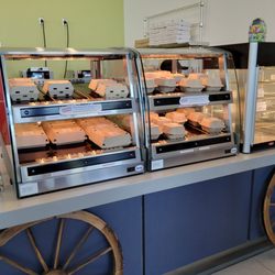 The Chuckwagon Cafe - Hot grab n' go items: daily special (via FB page), fries, fried okra, onion rings, burgers, fried chicken sandwiches, & pizza.