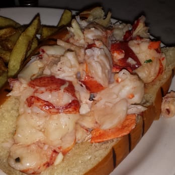 Neptune Oyster - Up close and personal lobster roll - Seafood Near Me - Boston, Massachusetts Neptune Oyster - Up close and personal lobster roll - Seafood Near Me - Boston, Massachusetts