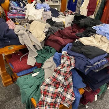 Macy's - Clothing discarded on top of displays - Department Stores Near Me - Orland Park, Illinois