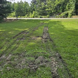 Red River Wrecker Service - Accident I front of my home. This is how red river wrecker service left my yard. How am I going to mow this mess.