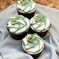 Grace Cakes Homemade Gourmet - Key Lime Cupcakes topped with Key Lime buttercream frosting and embellishments.