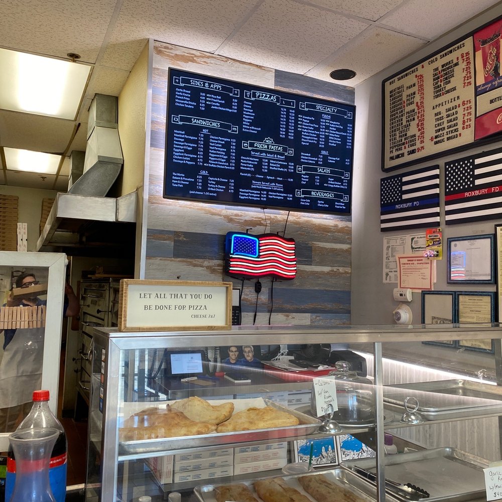 Digital menu behind counter Digital menu behind counter