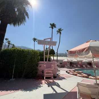 Trixie Motel - Trixie Motel sign & pool area by day - Hotels Near Me - Palm Springs, California Trixie Motel - Trixie Motel sign & pool area by day - Hotels Near Me - Palm Springs, California