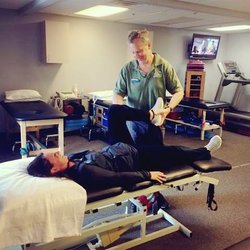 Crest Physical Therapy - Therapist working with patient.