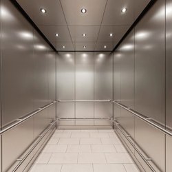 Elevator Professionals - Stainless steel elevator cab featuring a sleek, modern finish with durable wall panels, clean lines, and a professional contemporary look.