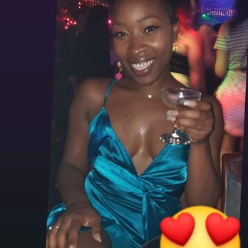 Salsatheque - a woman in a blue dress holding a glass of wine - Dance Clubs Near Me - Montreal, Quebec Salsatheque - a woman in a blue dress holding a glass of wine - Dance Clubs Near Me - Montreal, Quebec