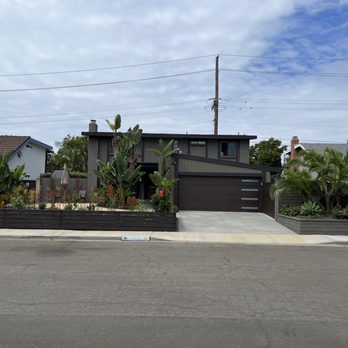 Top Shelf Painting - Front elevation, with brick walls and fence painted to match - Painters Near Me