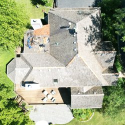 Dupage Roofing - Ridge Cap on your cedar shake takes and beating, we got this client done and the other section replaced.