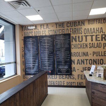 Wrap City - menus on the wall of a restaurant - Sandwiches Near Me - Salem, New Hampshire
