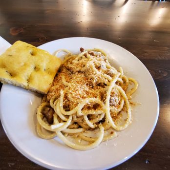 A'mano Fresh Pasta - Rosemary bread with bucatinii and breaded chicken and breadcrumbs and diced onion - Pasta Shops Near Me - Williamsville, New York