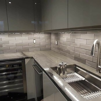 Taranto Tile Home Improvement - a kitchen with stainless steel appliances - Countertop Installation Near Me - Brooklyn, New York Taranto Tile Home Improvement - a kitchen with stainless steel appliances - Countertop Installation Near Me - Brooklyn, New York