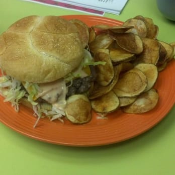 Dips & Dogs - a sandwich and chips on a plate - American Near Me - New Paris, Indiana Dips & Dogs - a sandwich and chips on a plate - American Near Me - New Paris, Indiana