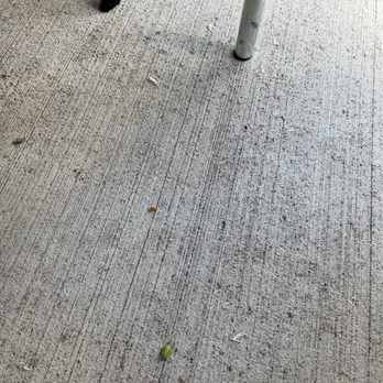 Grill House - Glass on the ground under table.  Time to clean the place up a bit for safety reasons. - American Near Me - Northbrook, Illinois