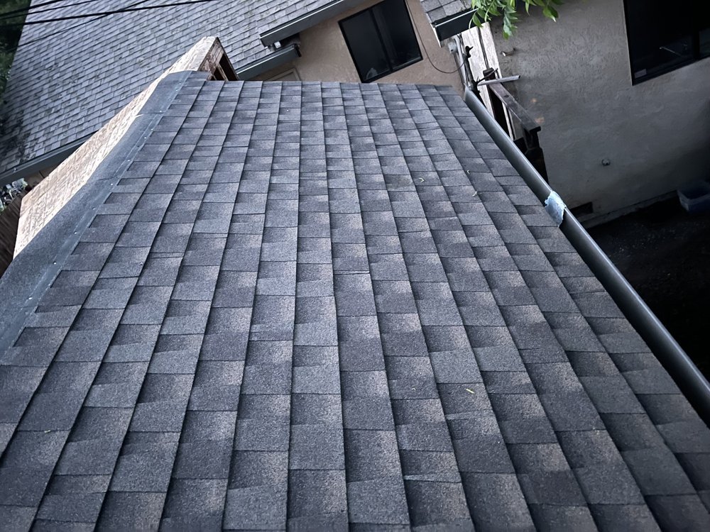 Slide of Roofing Pro's