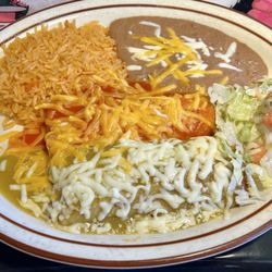 Combo #12. Enchilada(picked cheese) and tamale(comes smothered in chili verde sauce) w rice& beans.