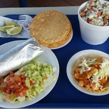El Ceviche Loco - Large camaron (shrimp) ceviche top right, grilled shrimp taco bottem right, shrimp burrito bottem left, and tostadas (: - Mexican Near Me - Bell, California El Ceviche Loco - Large camaron (shrimp) ceviche top right, grilled shrimp taco bottem right, shrimp burrito bottem left, and tostadas (: - Mexican Near Me - Bell, California