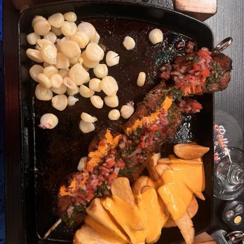 CVI.CHE 105 - Anticuchos de Corazón - Peruvian Near Me - Miami, Florida CVI.CHE 105 - Anticuchos de Corazón - Peruvian Near Me - Miami, Florida