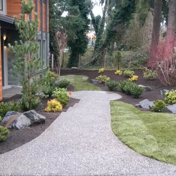 Associated Landscaping - a pathway leading to a building - Fences & Gates Near Me - Burien, Washington Associated Landscaping - a pathway leading to a building - Fences & Gates Near Me - Burien, Washington