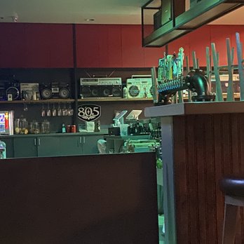 Supply & Demand - Boom boxes line the wall - Cocktail Bars Near Me - Long Beach, California Supply & Demand - Boom boxes line the wall - Cocktail Bars Near Me - Long Beach, California