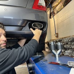 Nelson taking the time to show and explain each tailpipe to me while my car is on the lift. The service here is just top notch!