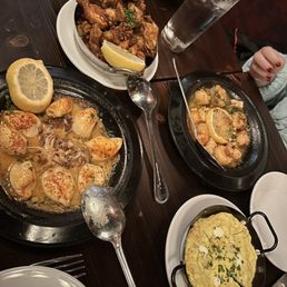 Baby squids, tortilla espanola, scallops, fried artichokes...all good but not very hot. Baby squids, tortilla espanola, scallops, fried artichokes...all good but not very hot.
