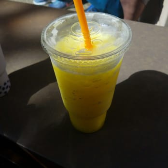 Co-Cool - a drink in a plastic cup with a straw - Bubble Tea Near Me - Freehold Township, New Jersey