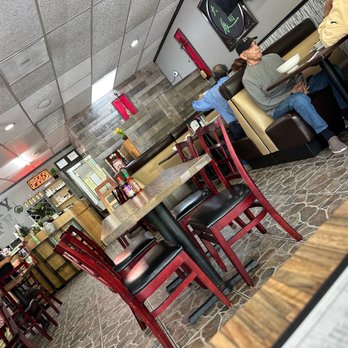 Lucky Cafe - people sitting at tables in a restaurant - Vietnamese Near Me - The Woodlands, Texas Lucky Cafe - people sitting at tables in a restaurant - Vietnamese Near Me - The Woodlands, Texas