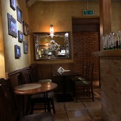 Dark Pub - One of the many alcoves available to eat or drink in.