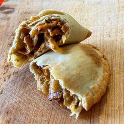 Crispy Pastry Shells filled with Broccoli & Cheese, Cheesesteak, Spinach & Ricotta, Breakfast, Shredded Chick'n, and Buffalo Chick'n Mac!
