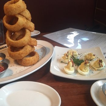 J. Alexander's - The onion rings are to die for.. devil eggs were good but the presentation could use some work.  Work lunch. - New American Near Me - Jacksonville, Florida