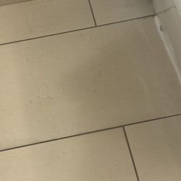 Leaking toilet; toilet water on the bathroom floor Leaking toilet; toilet water on the bathroom floor