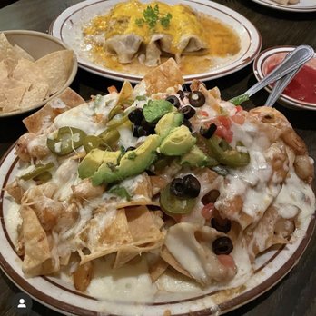 Mexicali Restaurants - Shrimp nachos (front) plus mini chile verde pork burritos (back) & salsa - Mexican Near Me - Bakersfield, California Mexicali Restaurants - Shrimp nachos (front) plus mini chile verde pork burritos (back) & salsa - Mexican Near Me - Bakersfield, California