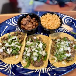 Three Lengua tacos - my wife said they were delicious and she didn't share!! She also got pinto beans and rice.