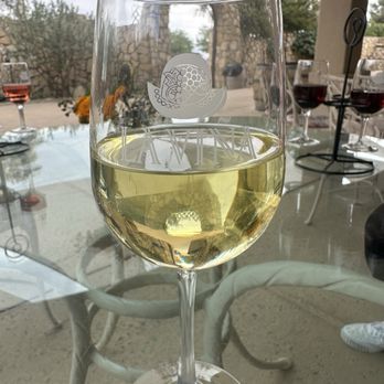 La Viña Winery - Glass of Sauvignon Blanc on the patio - Wineries Near Me - Anthony, New Mexico