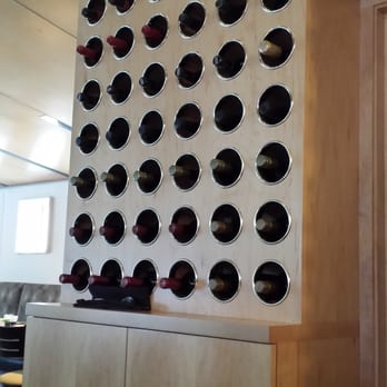 BB's - Wine rack decor - New American Near Me - Jacksonville, Florida BB's - Wine rack decor - New American Near Me - Jacksonville, Florida