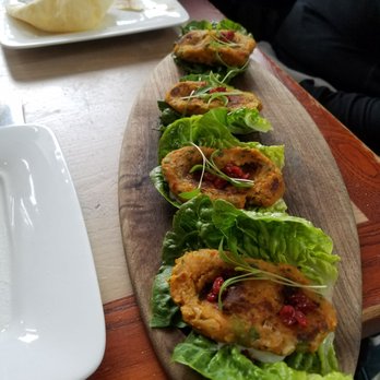 Zaytinya - Mercimek Köftesi | traditional seared red lentil patties, preserved lemon yogurt, pomegranate, lettuce leaves - Greek Near Me - Washington, DC, District of Columbia