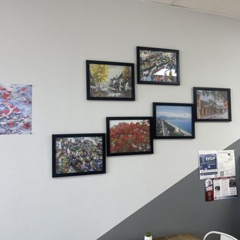 T-Pioca - a wall of framed pictures - Bubble Tea Near Me - San Antonio, Texas