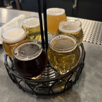 Crushed by Giants - $22 six beer flight. Geez I should have double checked the menu before ordering this. - Brewpubs Near Me - Chicago, Illinois