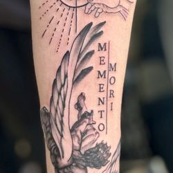 Custom Concepts Tattoos and Designs - Nick Holt with this abstract angelic design.