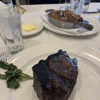 The Capital Grille - The bone in Steak and Augrautin potatoes - Steakhouses Near Me - Baltimore, Maryland The Capital Grille - The bone in Steak and Augrautin potatoes - Steakhouses Near Me - Baltimore, Maryland