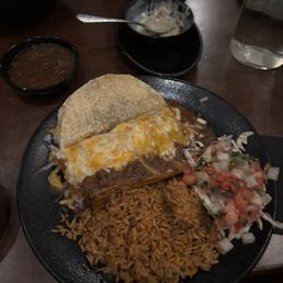 Tamale Platter with taco, enchilada and rice Tamale Platter with taco, enchilada and rice