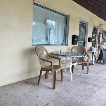 Anastasia Kitchen - a table and chairs outside of a restaurant - Diners Near Me - Saint Augustine, Florida