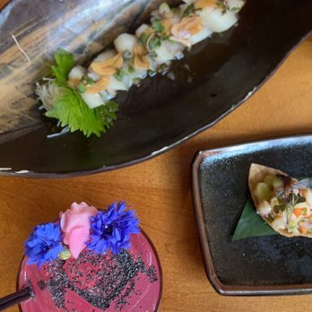 Roka Akor - Chicago - Sashimi yellowtail cold plate and Summer Snow cocktail - Sushi Bars Near Me - Chicago, Illinois Roka Akor - Chicago - Sashimi yellowtail cold plate and Summer Snow cocktail - Sushi Bars Near Me - Chicago, Illinois