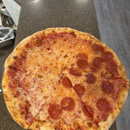 Beautifully made pizza, crispy crust, yummy sauce, overall delicious! Beautifully made pizza, crispy crust, yummy sauce, overall delicious!