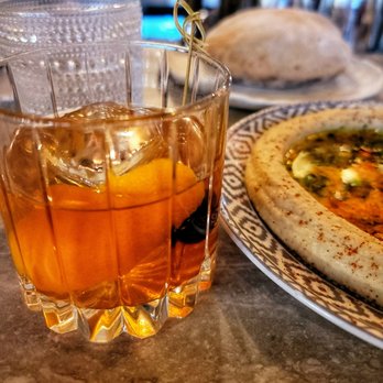 Ash'Kara - A yummy, strong Happy Hour Old Fashioned - Mediterranean Near Me - Denver, Colorado Ash'Kara - A yummy, strong Happy Hour Old Fashioned - Mediterranean Near Me - Denver, Colorado