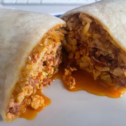 This is a chorizo and egg burrito. Although it looks a bit oily, the flavor was on point!