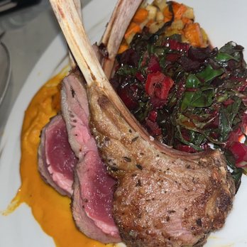 Partake Shop Lounge and Dine - Lamb lollipops, winter greens, root veggie hash, carrot butter - Cheese Shops Near Me - Grants Pass, Oregon