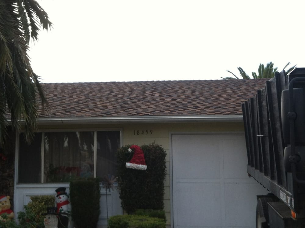 Slide of T J Roofing